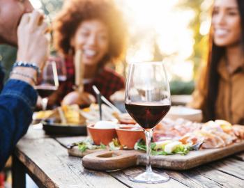 friends eating dinner outside