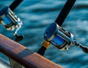 fishing poles mounted on a charter boat