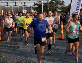 And they're off. Racers begin the 13.1 mile Flying Pirate Half Marathon.