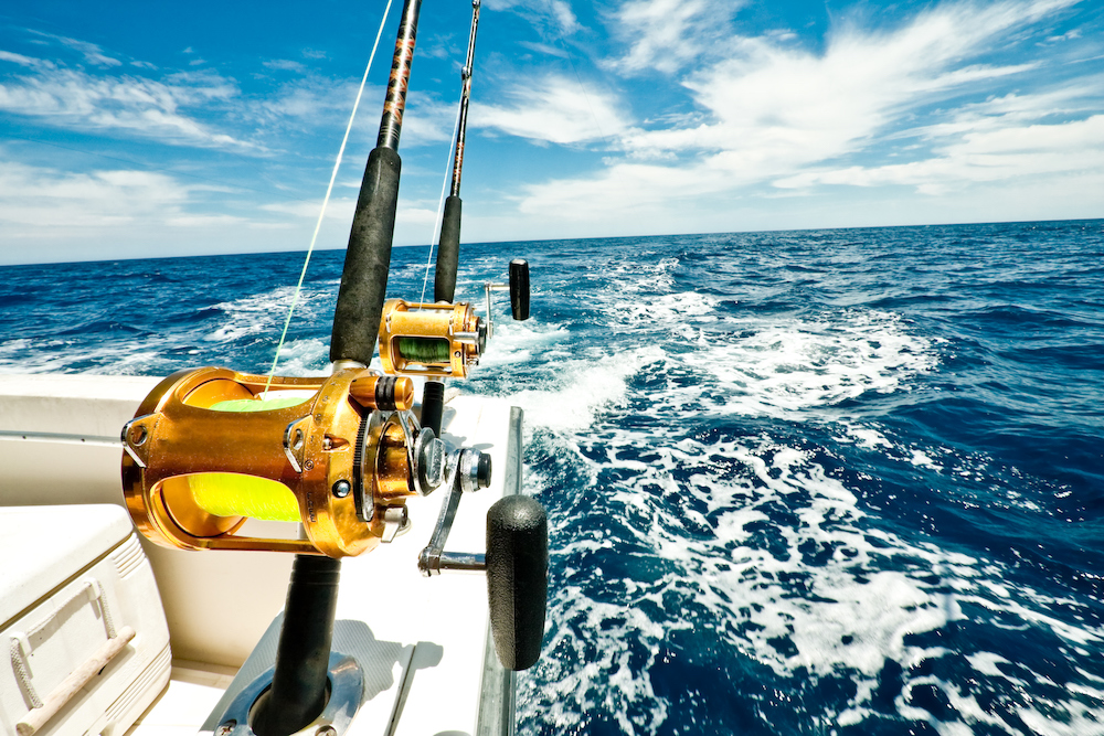 close up of fishing pole on a charter boat